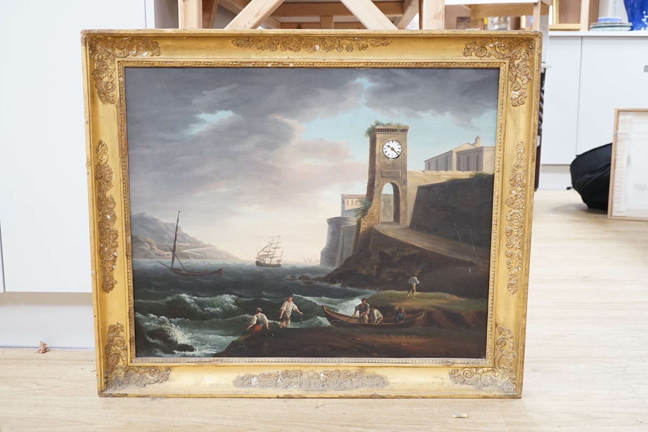 A mid 19th century Continental picture clock with later box back, oil on canvas, in a giltwood and composite frame, 72 x 86cm